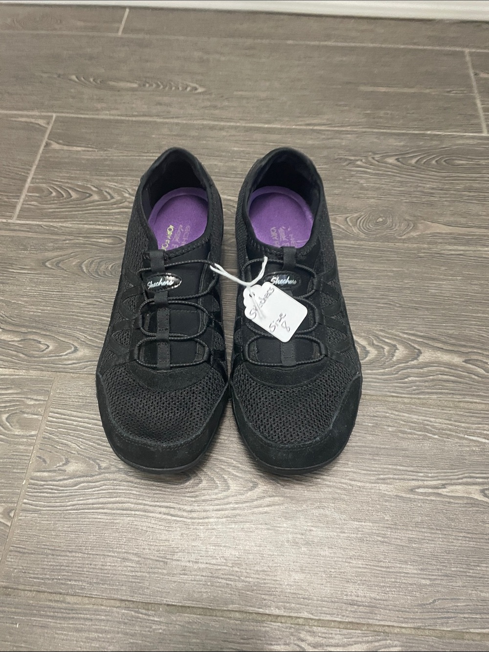 Skechers Women's Black Slip-On Sneakers with Purple Insole